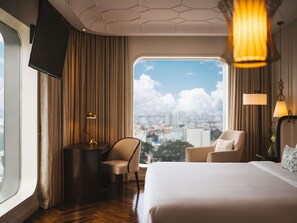 Deluxe Room, 1 King Bed, City View, Corner | Hypo-allergenic bedding, minibar, in-room safe, desk - Hôtel des Arts Saigon - MGallery Collection (Ho Chi Minh City)