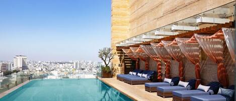 Outdoor pool, open 6:00 AM to 8:00 PM, sun loungers