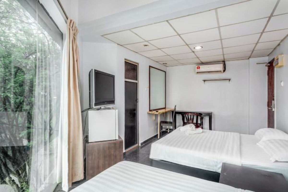 Super Deluxe Triple Room