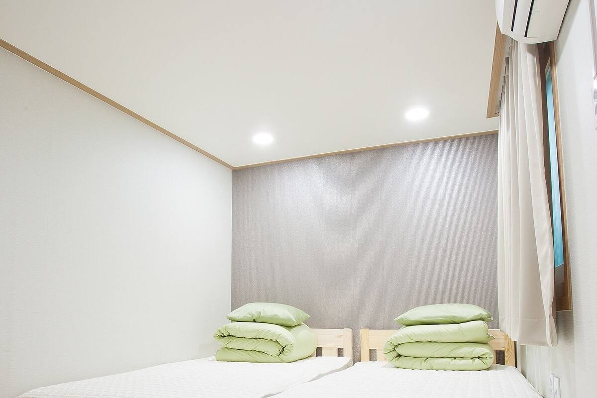 Twin Room | Premium bedding, iron/ironing board (on request), WiFi (free)