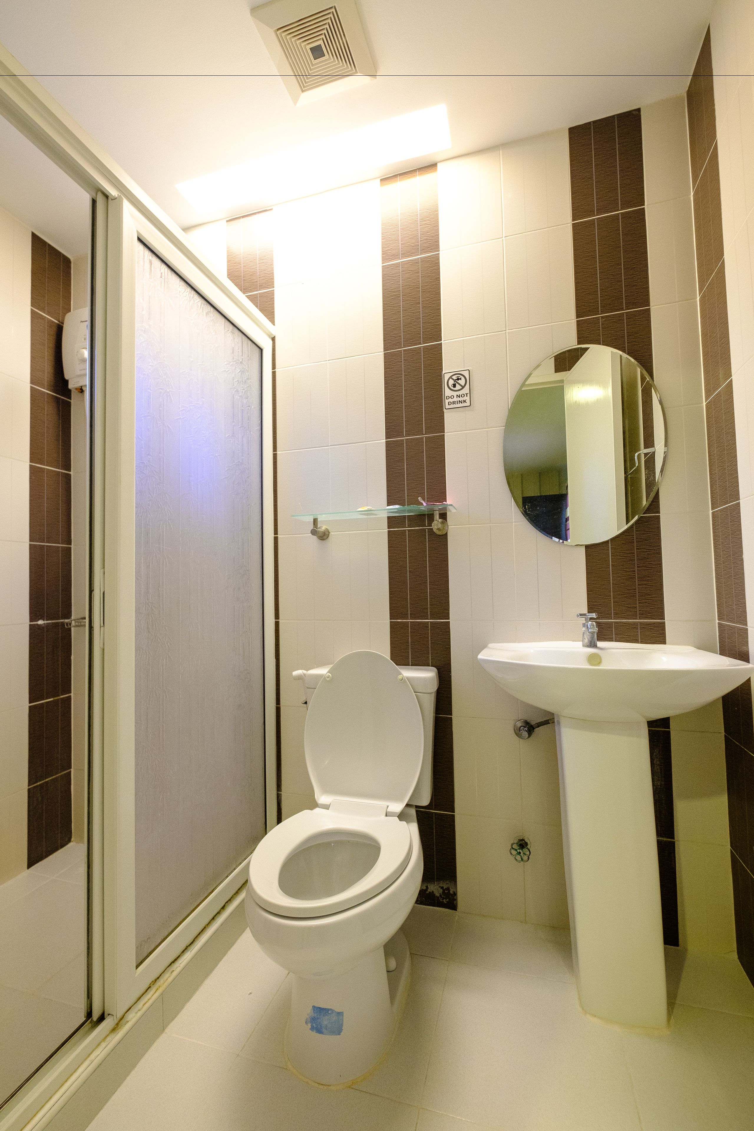 sunset poolside | bathroom | shower, rainfall showerhead, free toiletries, hair dryer