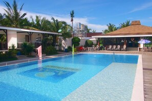 Outdoor pool, open 6 AM to 8 PM, sun loungers