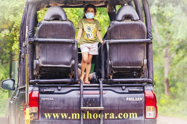 A vehicle with a ladder leading to the back, a Toyota logo, and a website URL. - Mahoora - Yala by Eco Team (Kataragama)