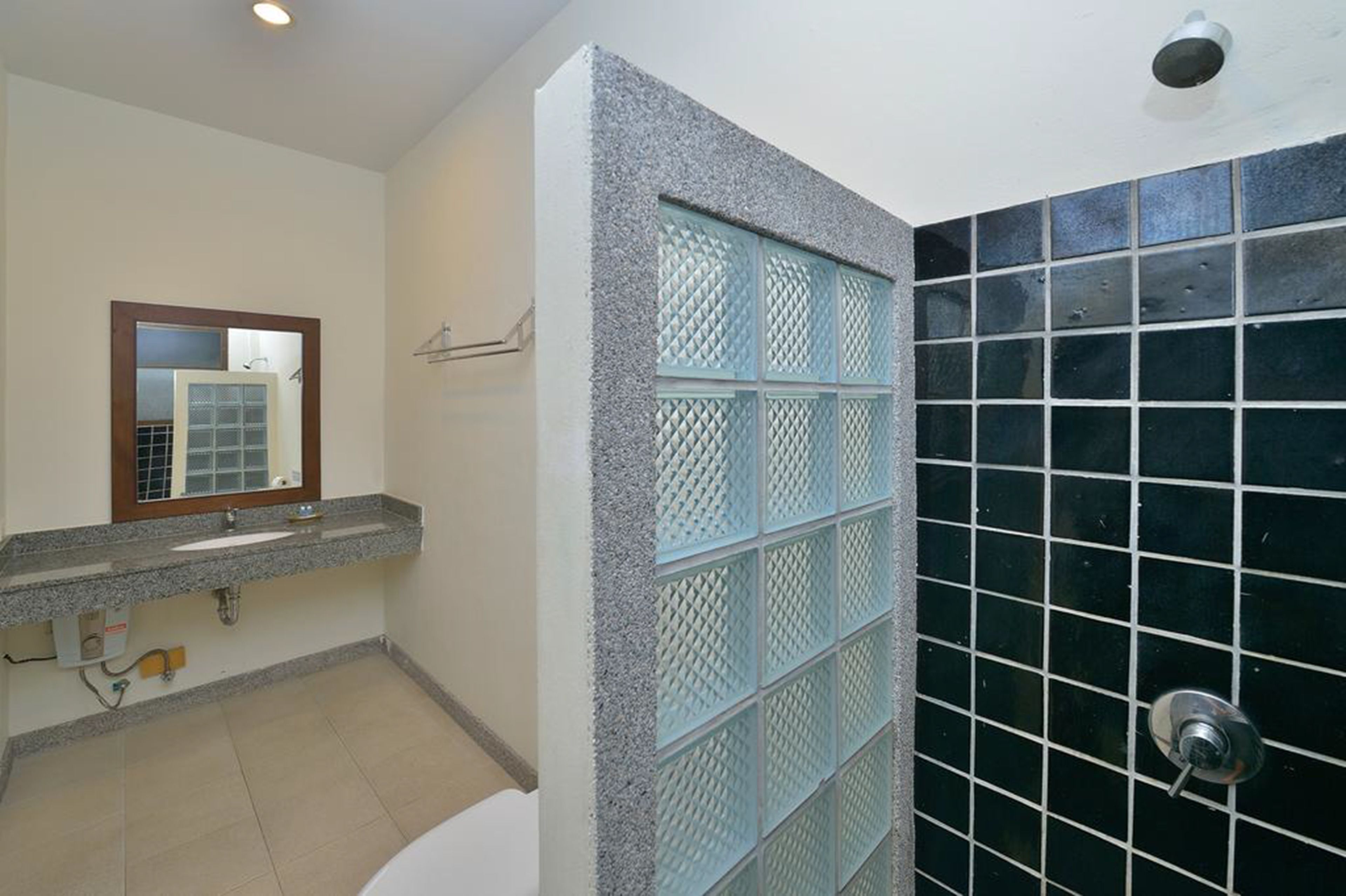 superior room | bathroom | shower, free toiletries, towels