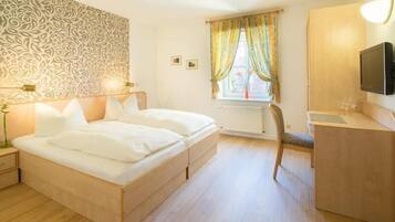 Desk, free WiFi, bed sheets