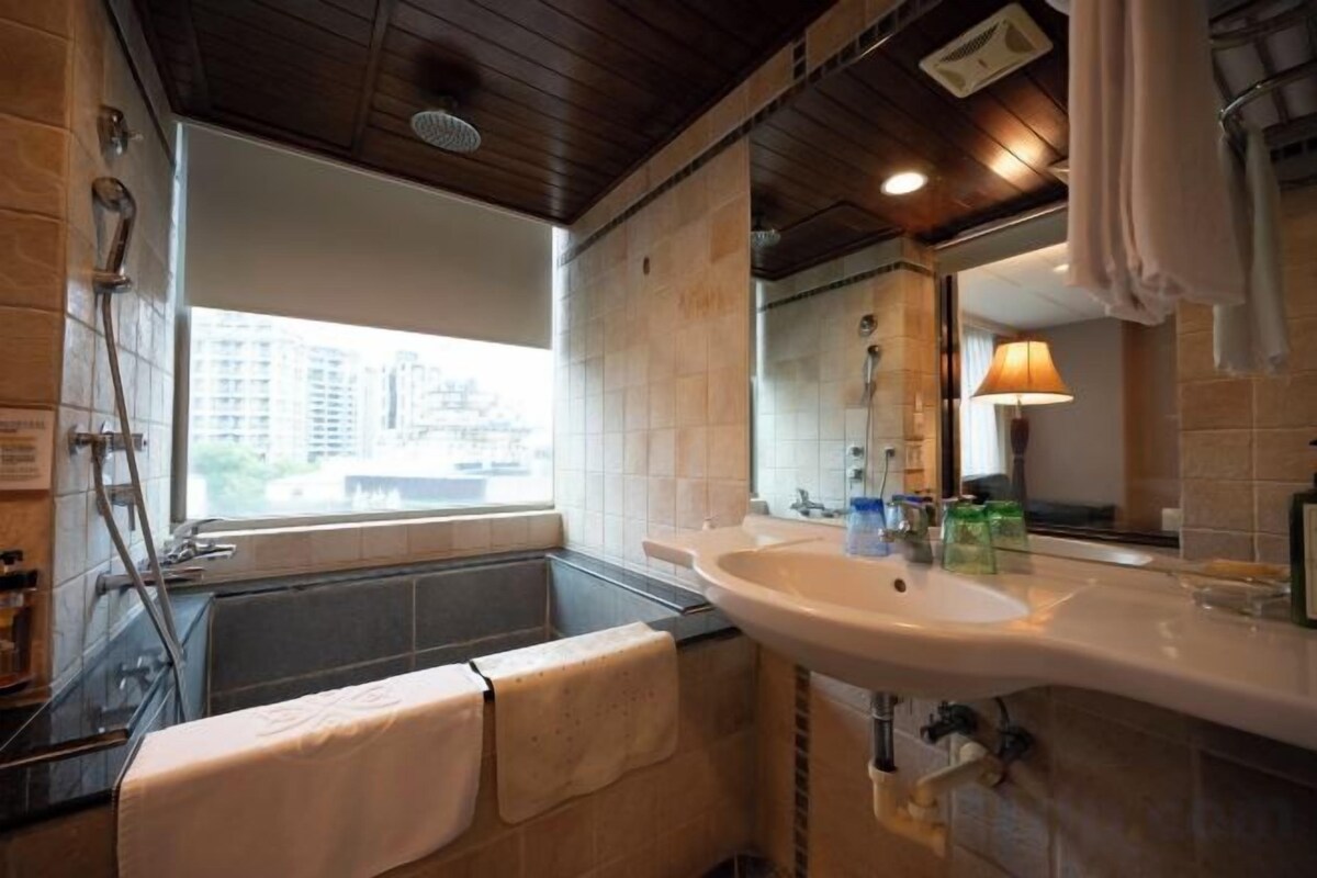Bathroom | Separate tub and shower, hair dryer, bathrobes, slippers