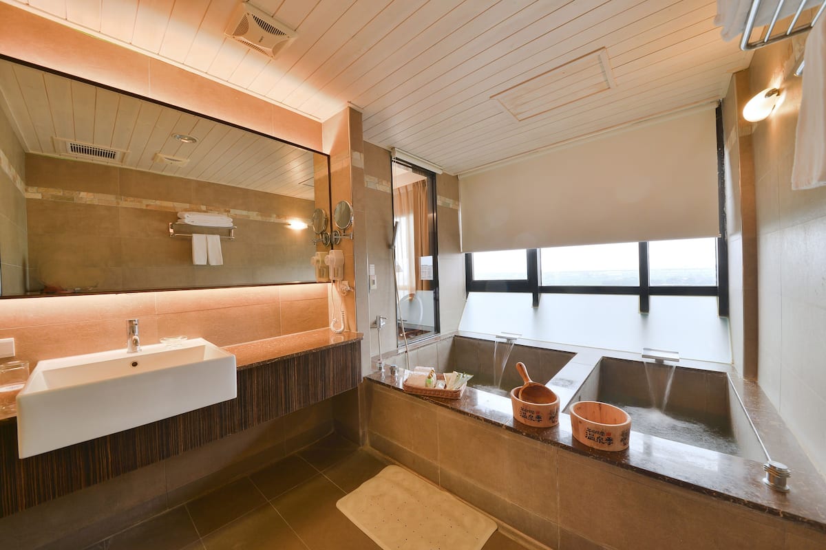 elite twin room, 2 single beds | bathroom | separate bathtub and shower, hair dryer, bathrobes, slippers