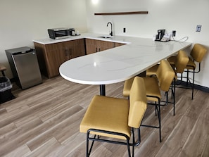 Junior Suite, Lake View | Living area | 43-inch TV with cable channels, streaming services