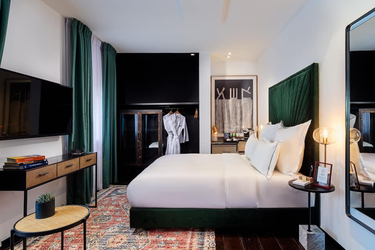 Family Studio, City View | Egyptian cotton sheets, premium bedding, in-room safe, desk