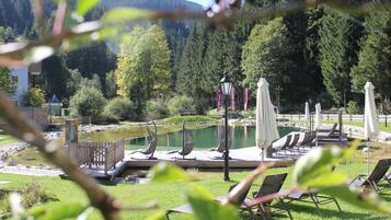 Indoor pool, outdoor pool, pool umbrellas, pool loungers