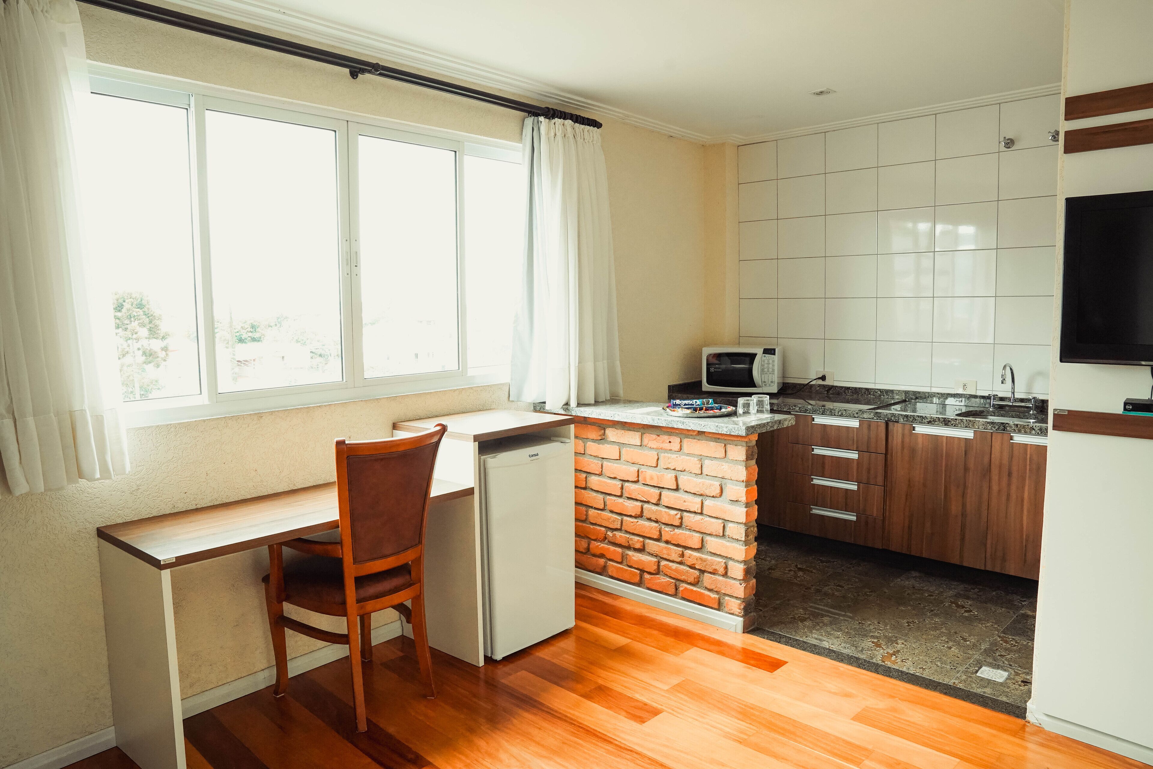 premium double room, 1 queen bed | private kitchen