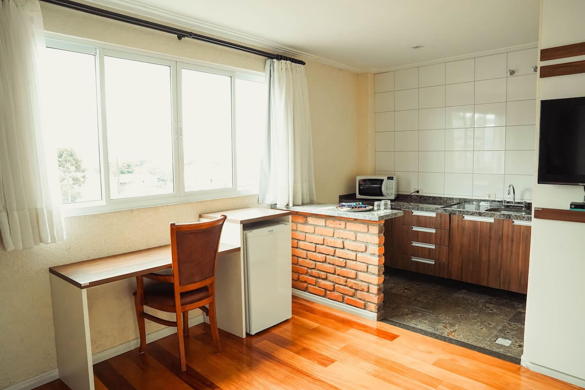 premium double room, 1 queen bed | private kitchen