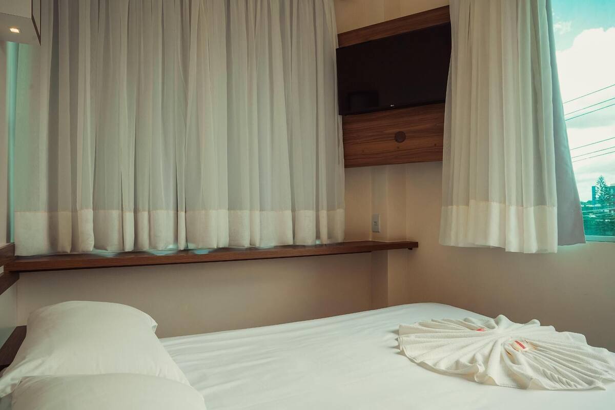 Minibar, blackout drapes, WiFi (free), bed sheets
