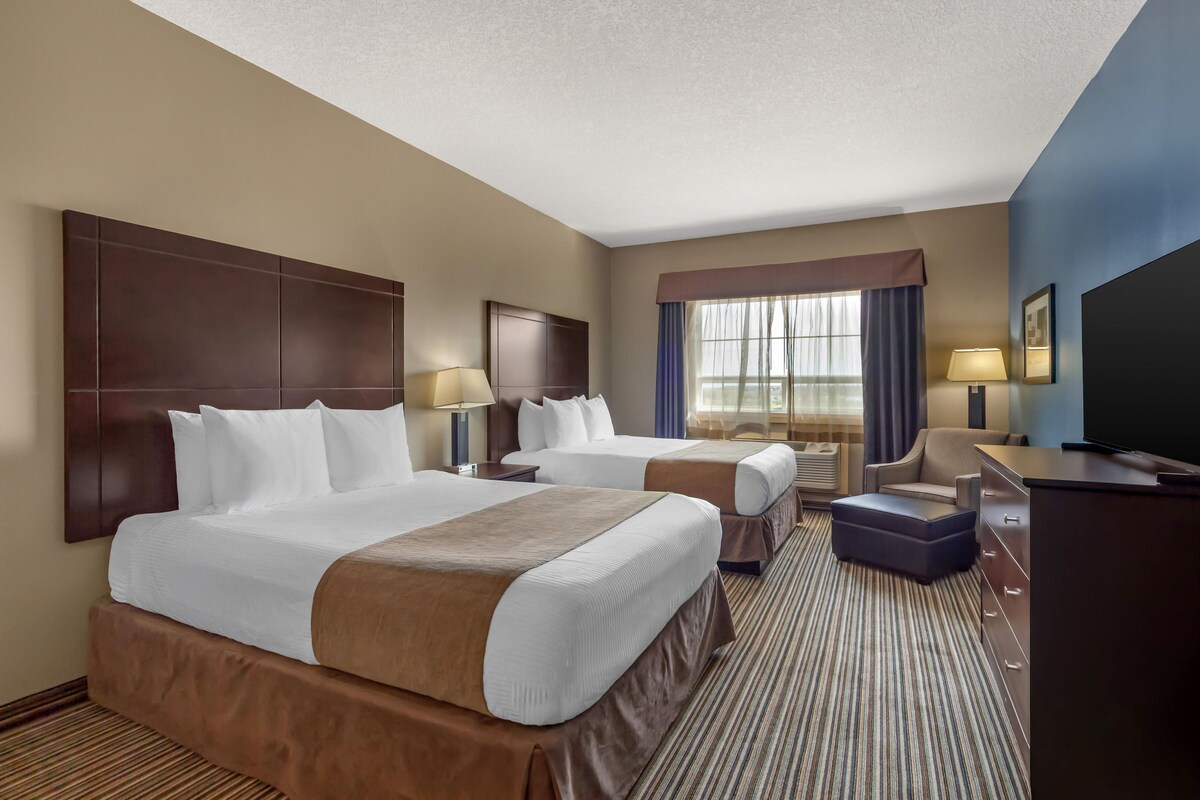 Suite, 2 Queen Beds, Non Smoking, Kitchenette (with Sofabed) | Pillowtop beds, desk, laptop workspace, iron/ironing board