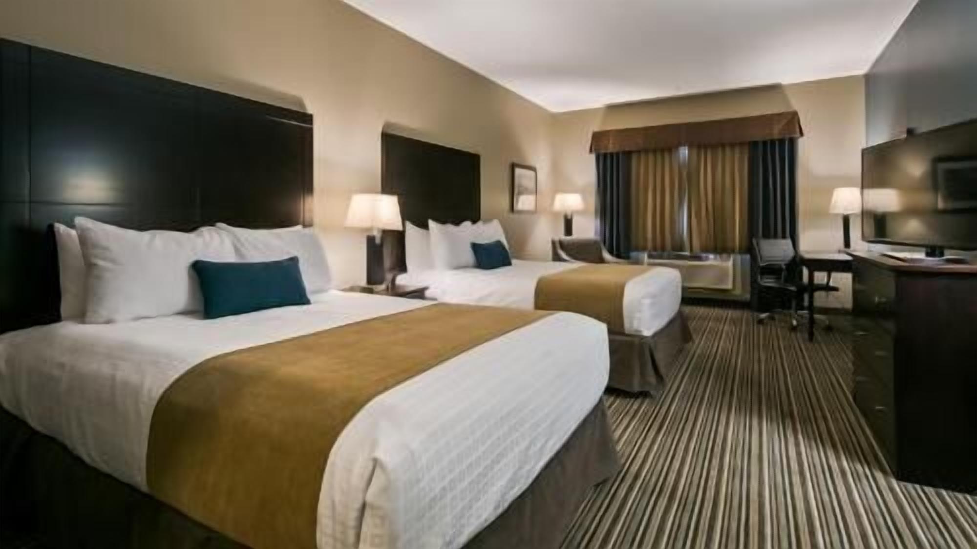 Pillow-top beds, desk, laptop workspace, iron/ironing board