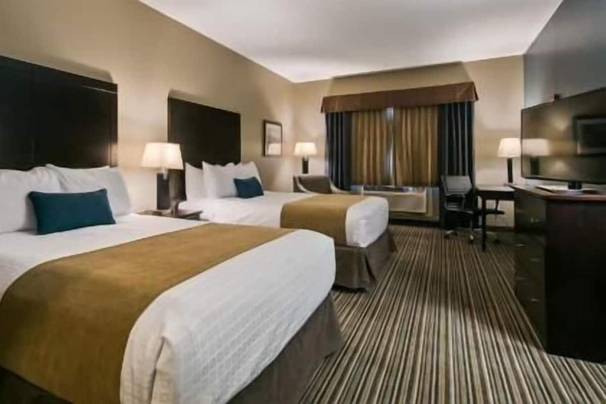 Pillow-top beds, desk, laptop workspace, iron/ironing board