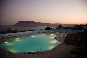 Outdoor pool, pool umbrellas, pool loungers