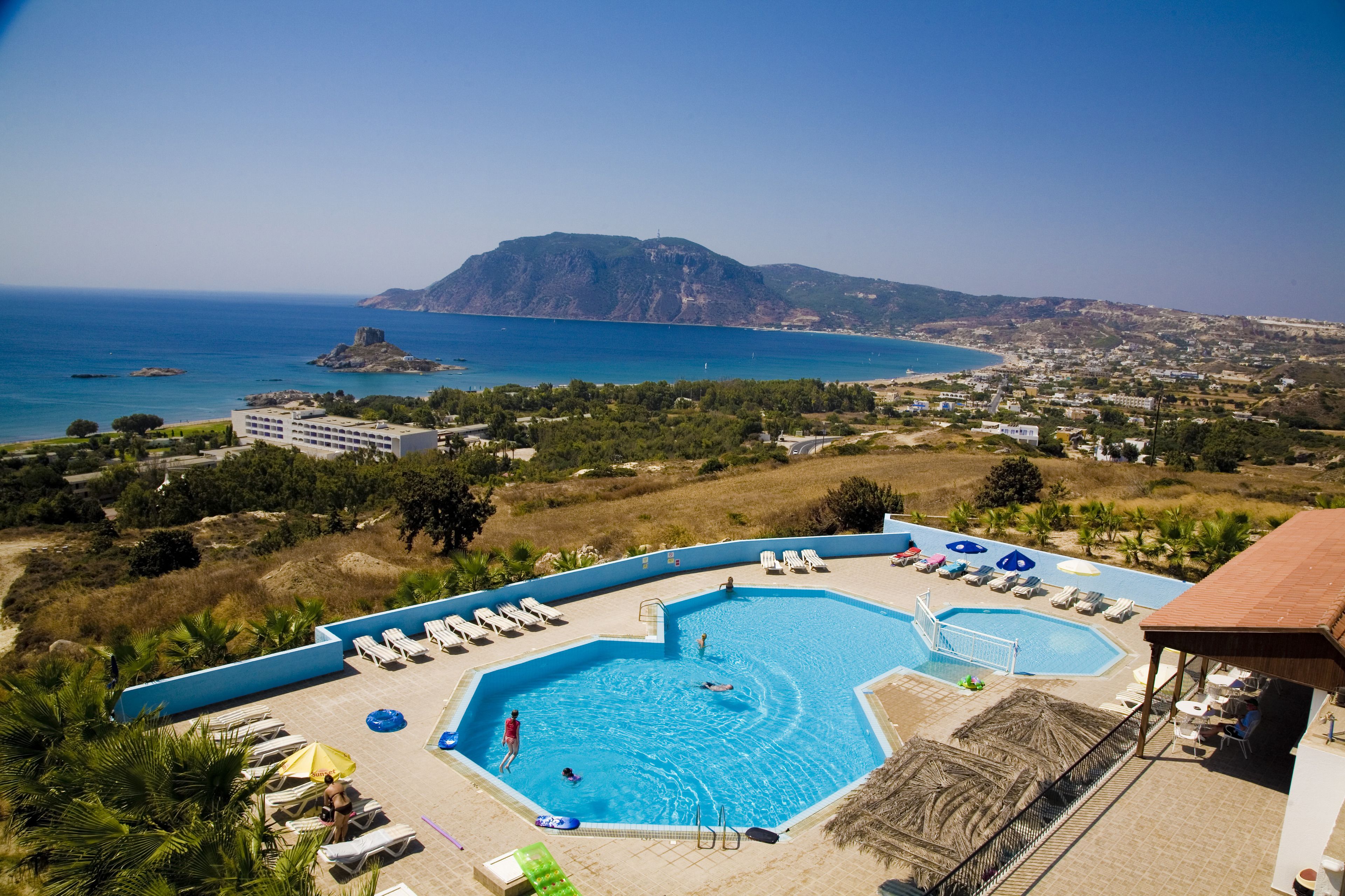 outdoor pool, pool umbrellas, pool loungers