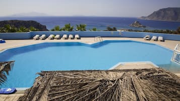 Outdoor pool, pool umbrellas, pool loungers