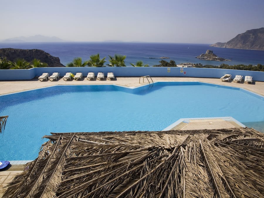 Outdoor pool, pool umbrellas, sun loungers