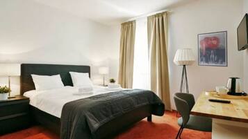 Coffres-forts dans les chambres, bureau, rideaux occultants