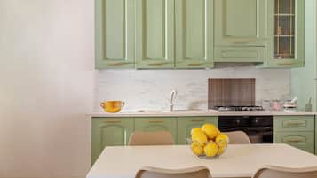 Apartment, 1 Bedroom | Private kitchen | Full-sized fridge, oven, stovetop, coffee/tea maker