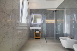 Design Suite | Bathroom | Shower, hair dryer, bathrobes, slippers - Case Vacanza Loria (San Vito Lo Capo)