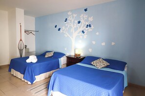 Standard Quadruple Room | Premium bedding, rollaway beds, bed sheets, wheelchair access - Bay View Hotel (San Carlos)