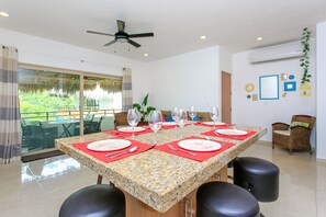 Deluxe Penthouse, 2 Bedrooms, Jetted Tub, Garden Area | Dining room - Condos Perfectly Situated Between the Beach & Tulum Town by Stella Rentals (Tulum)