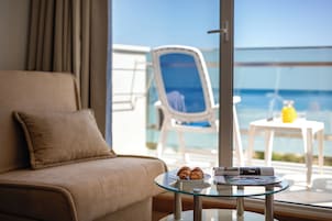 Standard Triple Room, Balcony, Sea View | In-room safe, desk, blackout curtains, cots/infant beds