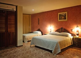 Suite | Tabla de planchar con plancha, wifi gratis, ropa de cama