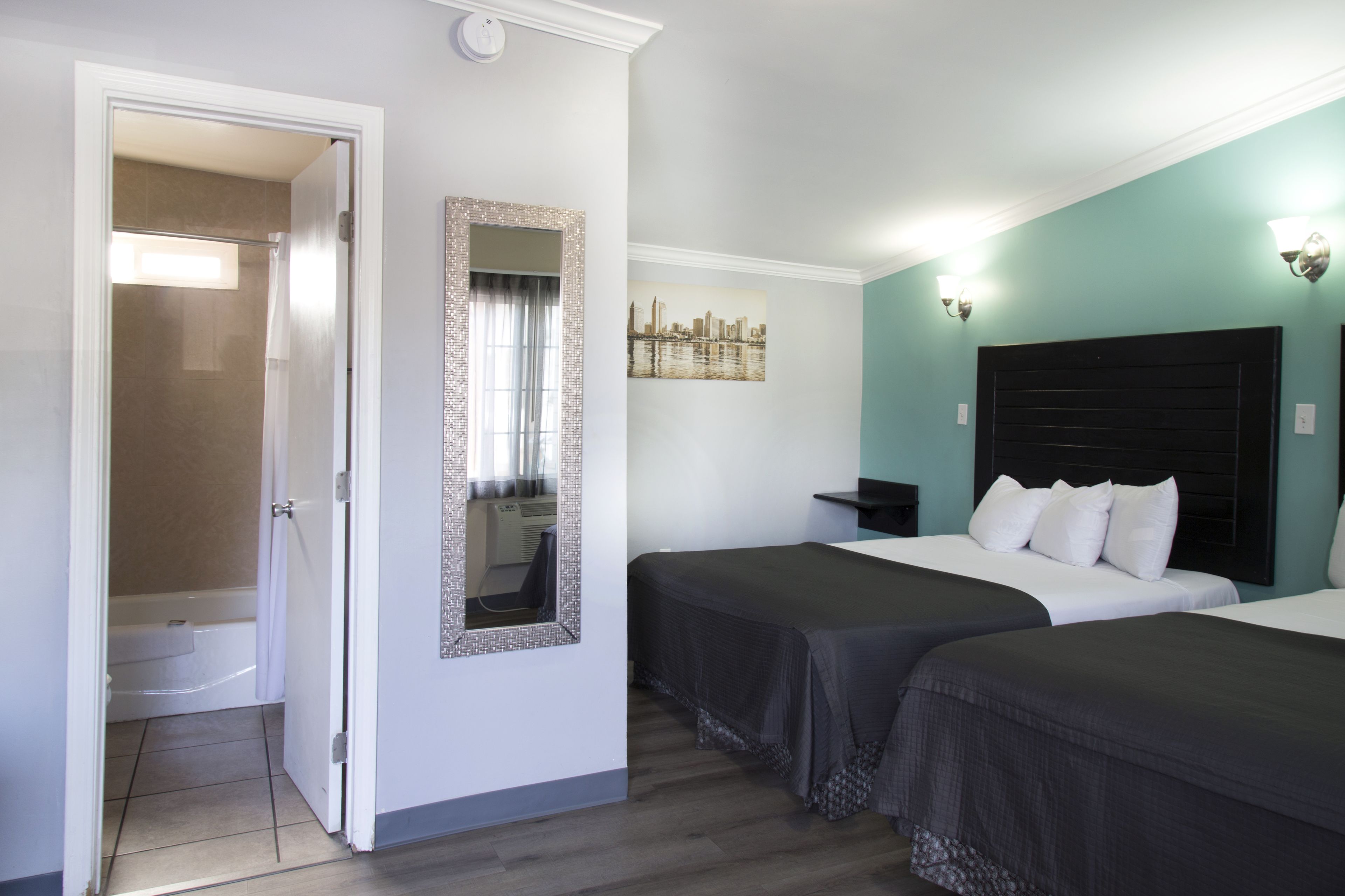 Room, 2 Queen Beds, Non Smoking | Desk, blackout curtains, iron/ironing board, free WiFi