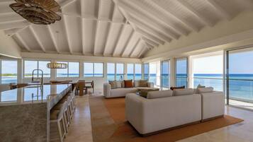 Premier Suite, 1 Double Bed, Ocean View (Penthouse) | Living area | 32-inch flat-screen TV with cable channels, TV, books