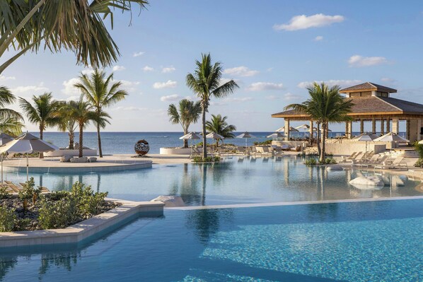 3 outdoor pools, pool umbrellas, pool loungers
