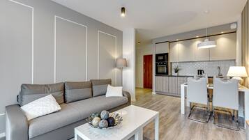 Deluxe Apartment, 1 Bedroom, Balcony ((Jaglana 6B street) 18) | Living room | Flat-screen TV