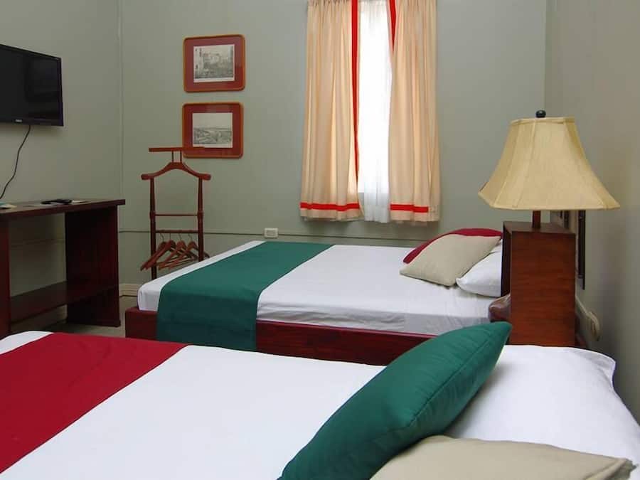 Premium bedding, desk, laptop workspace, free WiFi