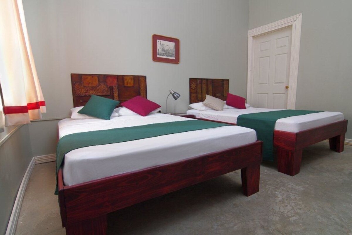 Premium bedding, desk, laptop workspace, WiFi (free)