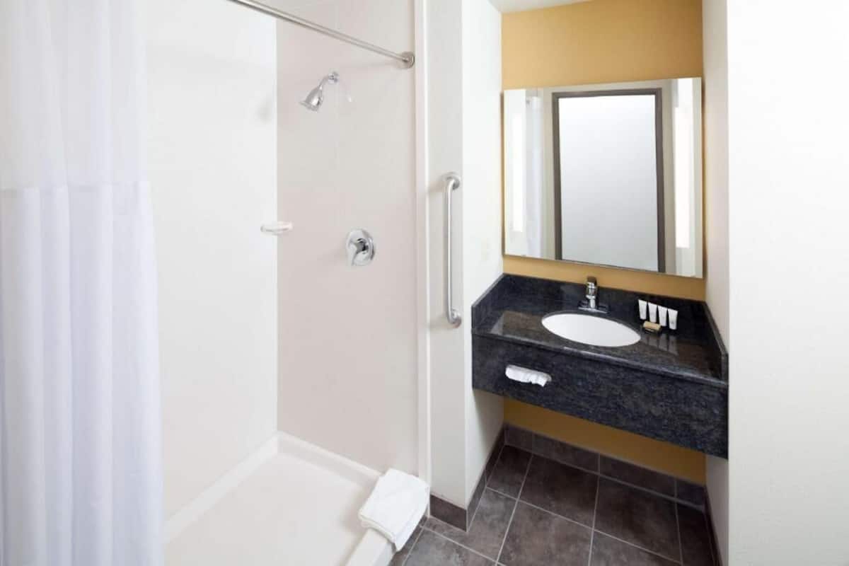 Bathroom | Shower, free toiletries, hair dryer, towels