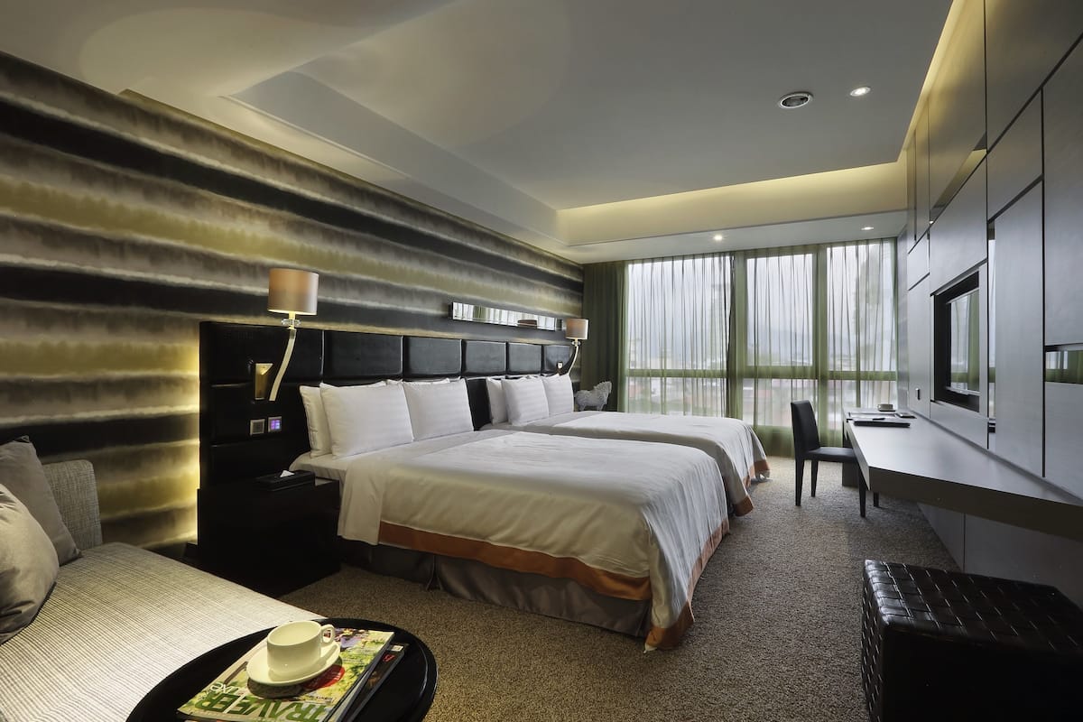 Deluxe Twin kamer, 1 slaapkamer | 1 slaapkamer, luxe beddengoed, een gratis minibar, een kluis op de kamer
