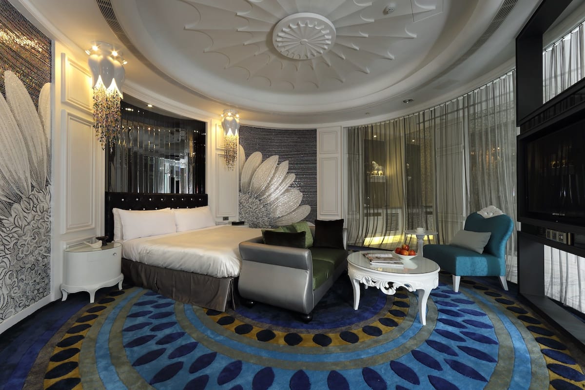 Luxe suite, 1 kingsize bed | 1 slaapkamer, luxe beddengoed, een gratis minibar, een kluis op de kamer
