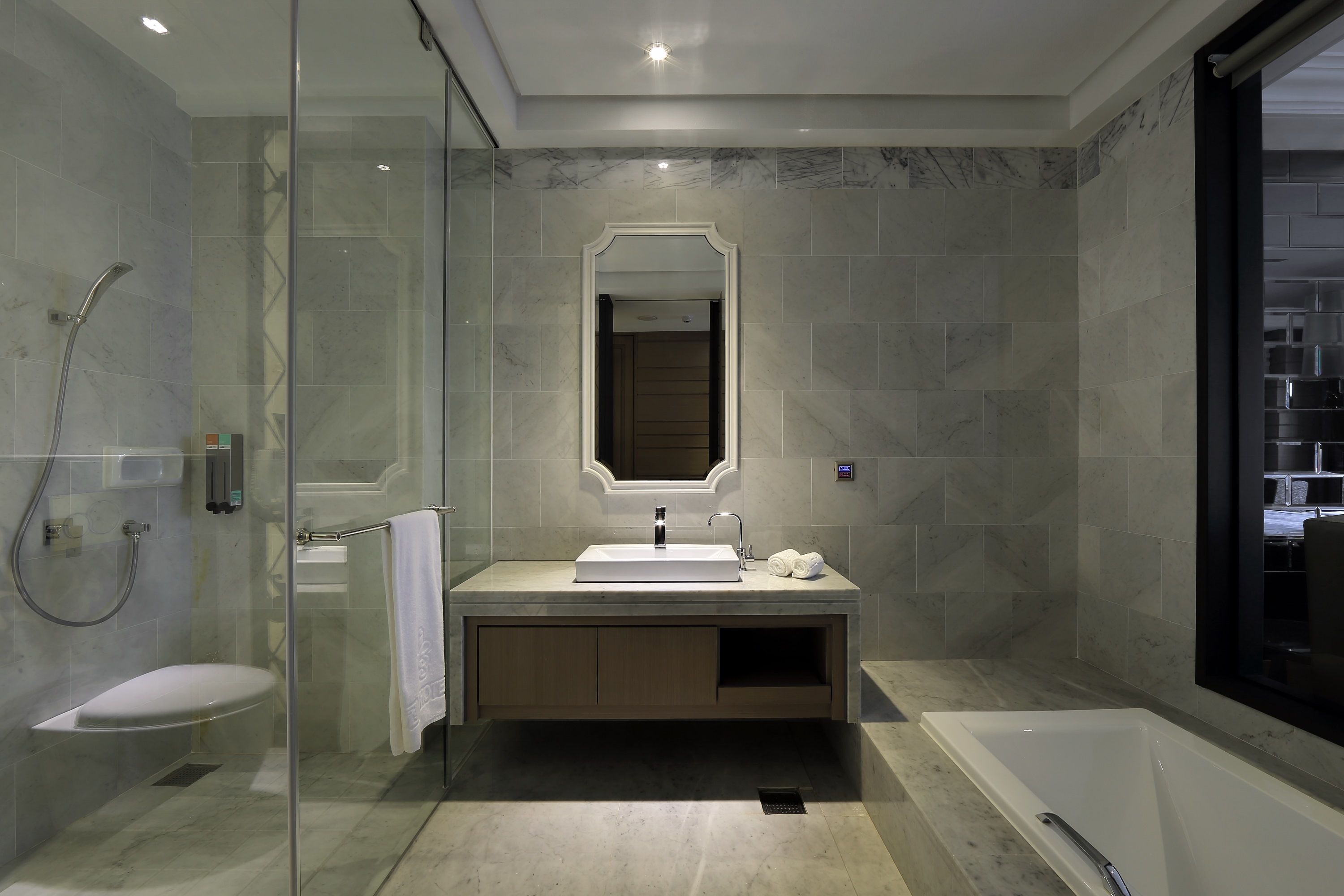 separate bathtub and shower, deep-soaking bathtub, hair dryer, slippers