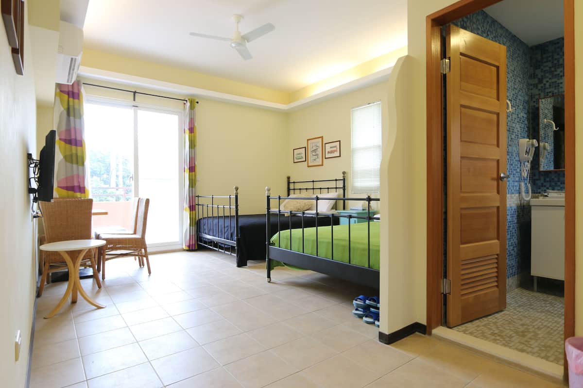 Deluxe Quadruple Room | Premium bedding, down comforters, blackout drapes, WiFi (free)