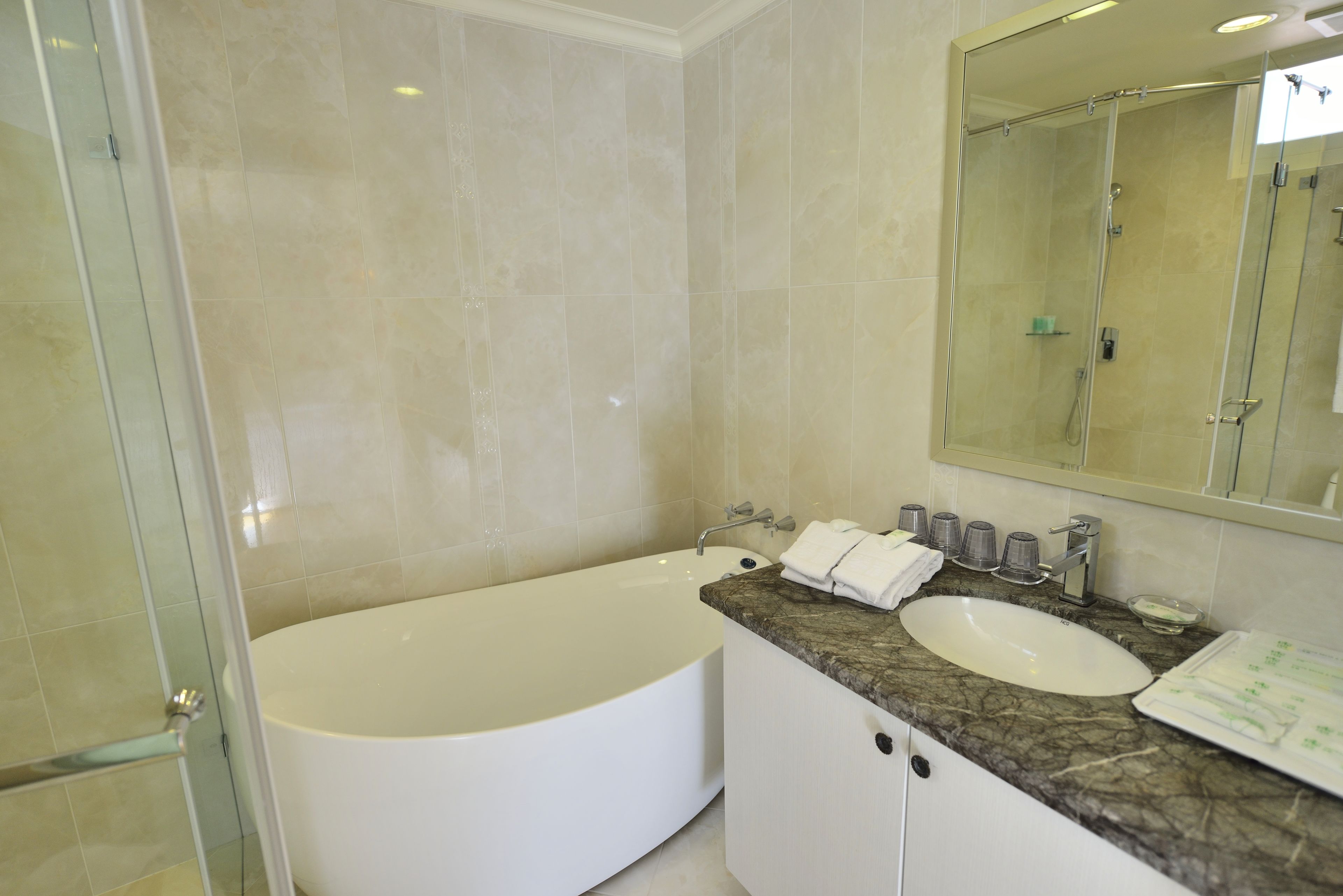 family quadruple room | bathroom | shower, free toiletries, hair dryer, slippers