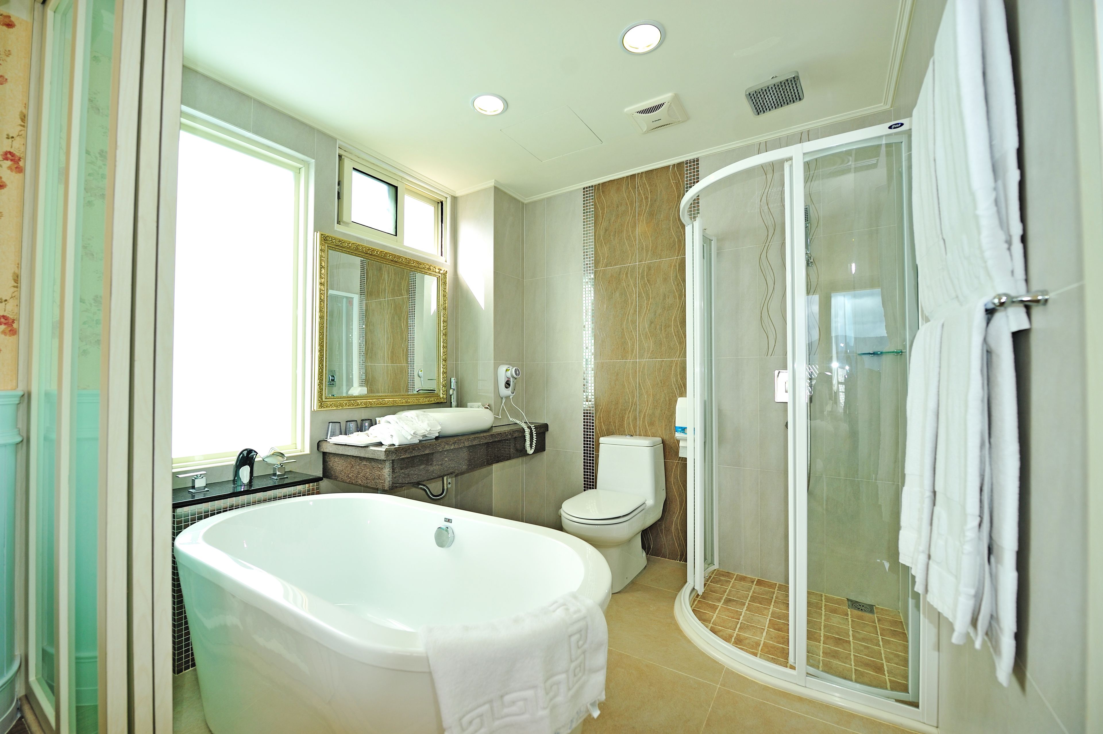 family quadruple room | bathroom | shower, free toiletries, hair dryer, slippers