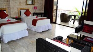 A hotel room with two beds, a balcony, and a seating area. - Eden Resort (Santander)