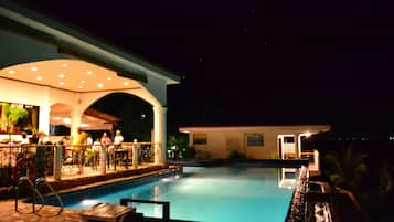 2 outdoor pools, open 8 AM to 10 PM, pool loungers