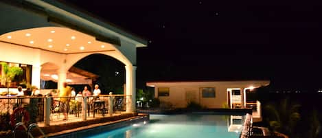 2 outdoor pools, open 8 AM to 10 PM, pool loungers