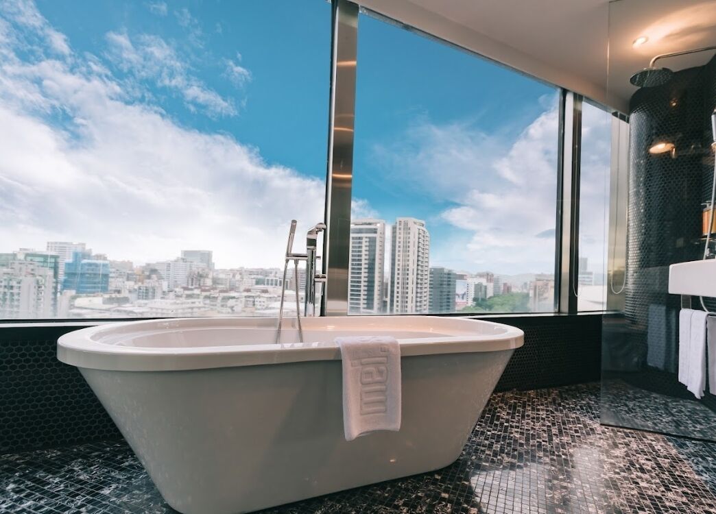 meistay suite 103 | bathroom | shower, hair dryer, towels, shampoo