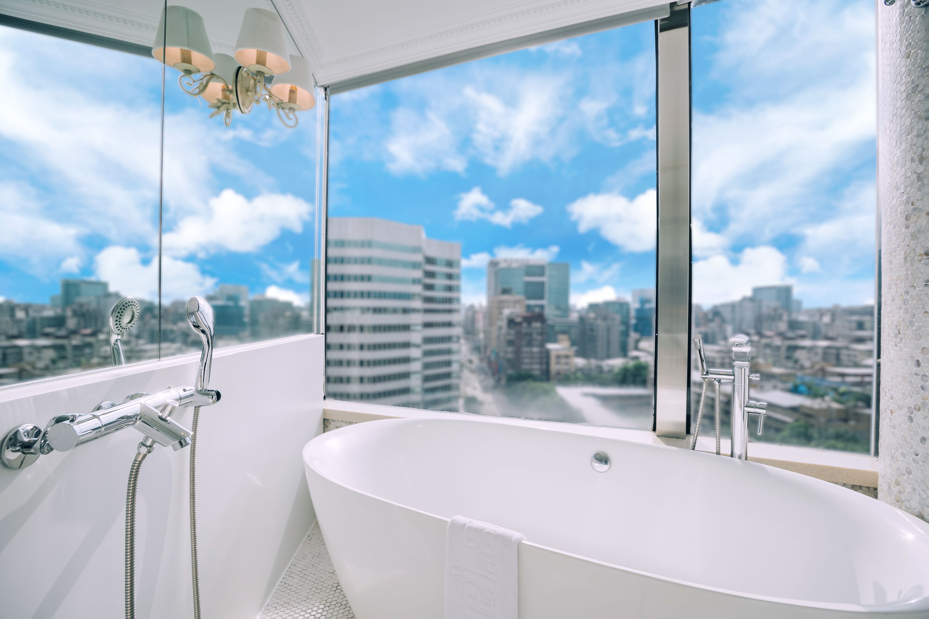 meistay suite 105 | bathroom | shower, hair dryer, towels, shampoo