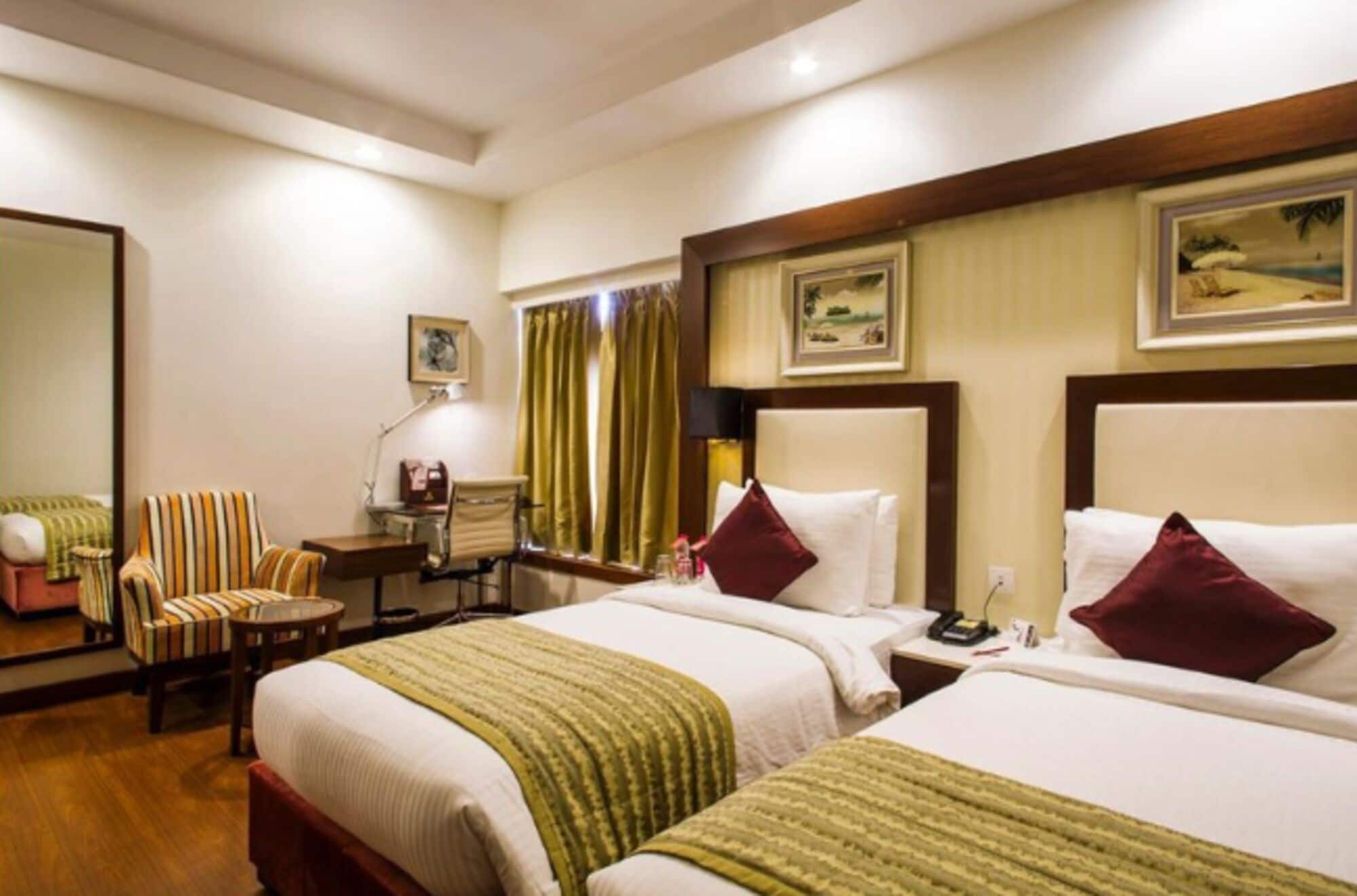 Deluxe Twin Room, City View | Minibar, in-room safe, desk, free WiFi